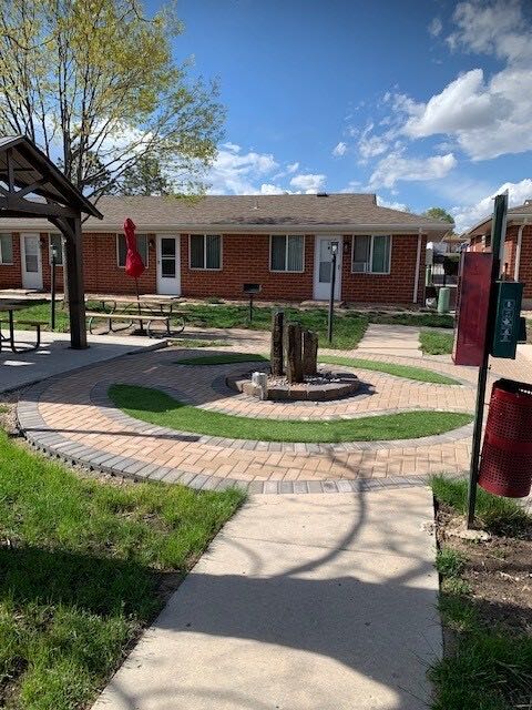 Courtyard picnic tables and grilling area