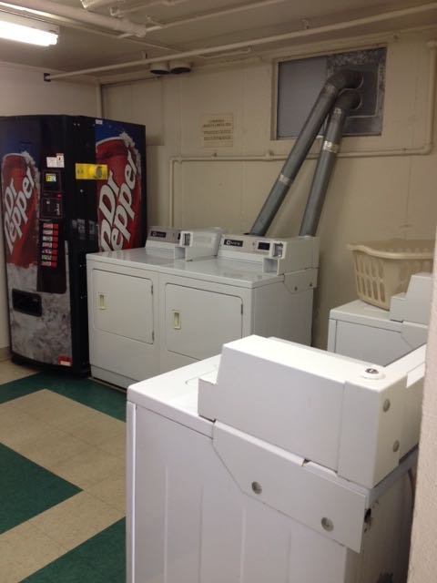 On-site laundry facility with washers and dryers
